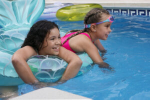 Children Having Fun With Floater Pool