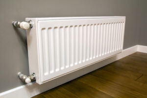 White Metal Heating Radiator Mounted Gray Wall