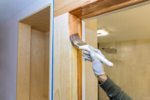 Hand Repairman Painting With Gloves Brush Applying Varnish Paint Wood