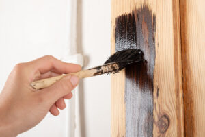 Varnishing Doorway Applying Varnish With Brush Wooden Surface