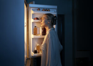 Side View Woman Looking Fridge