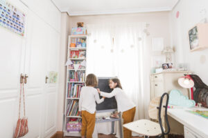 Sisters Drawing Blackboard