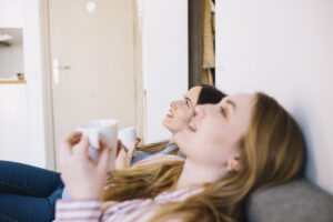 Side View Women With Mugs